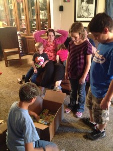 Kiddos opening the Party Pack from House Party!